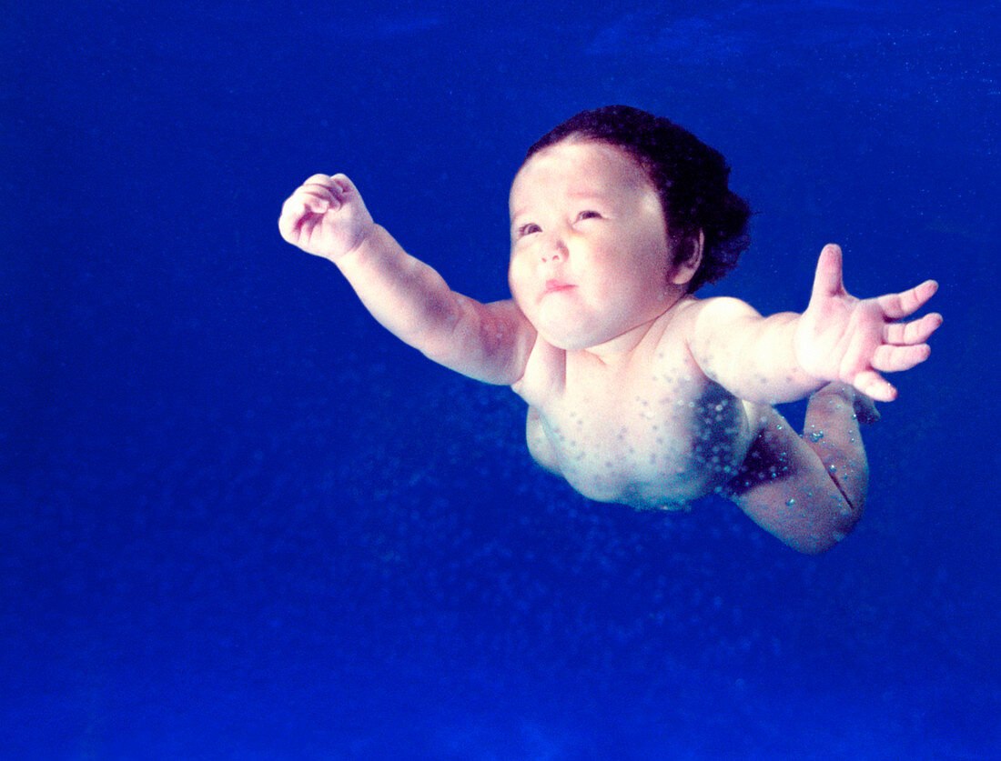 Baby swimming underwater