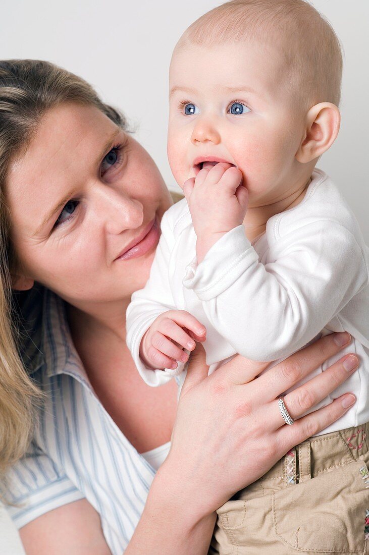 Mother holding her baby