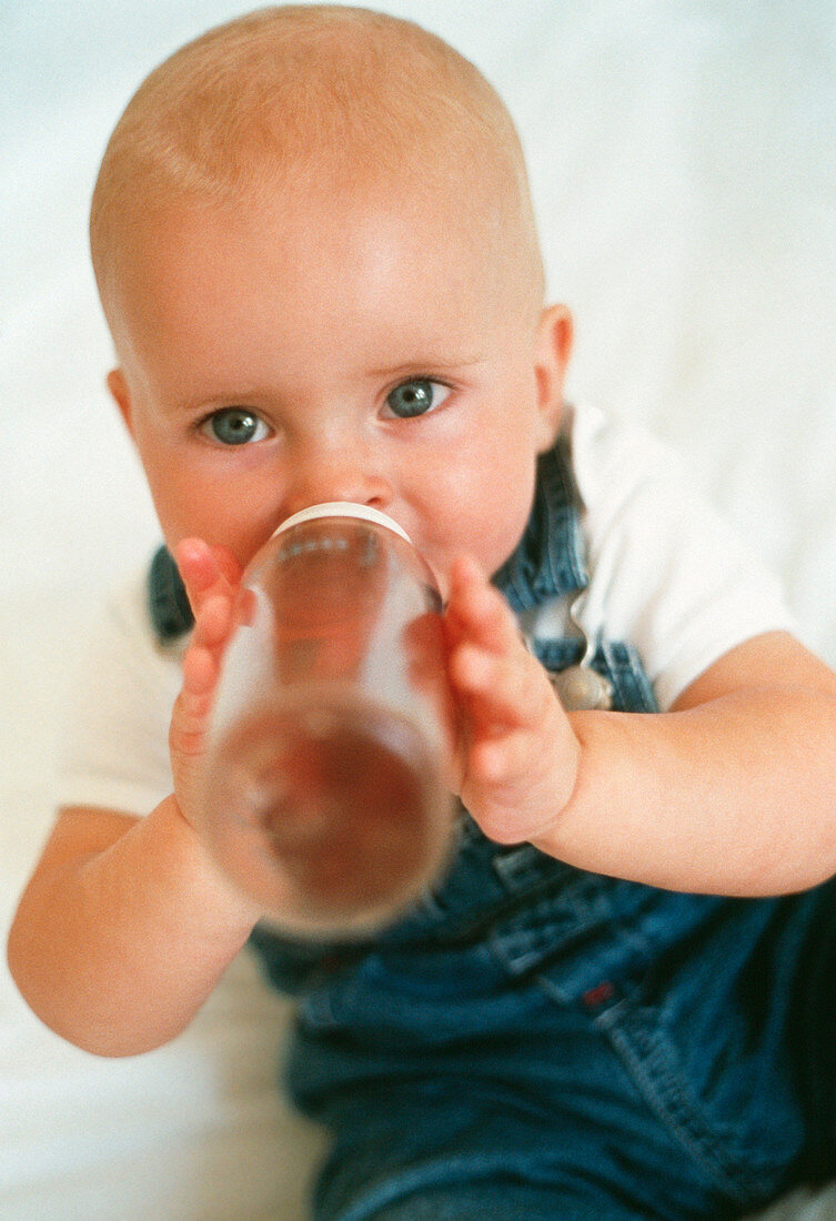 Baby boy drinking