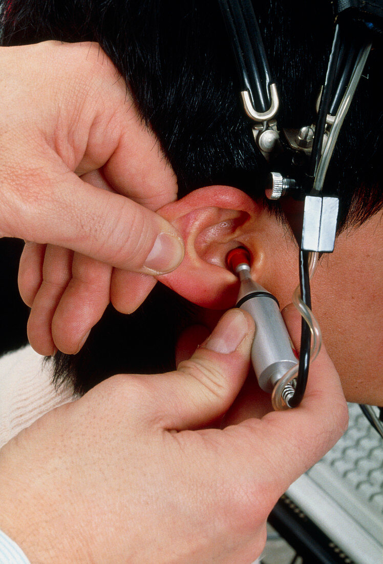 Patient having hearing test after cochlea