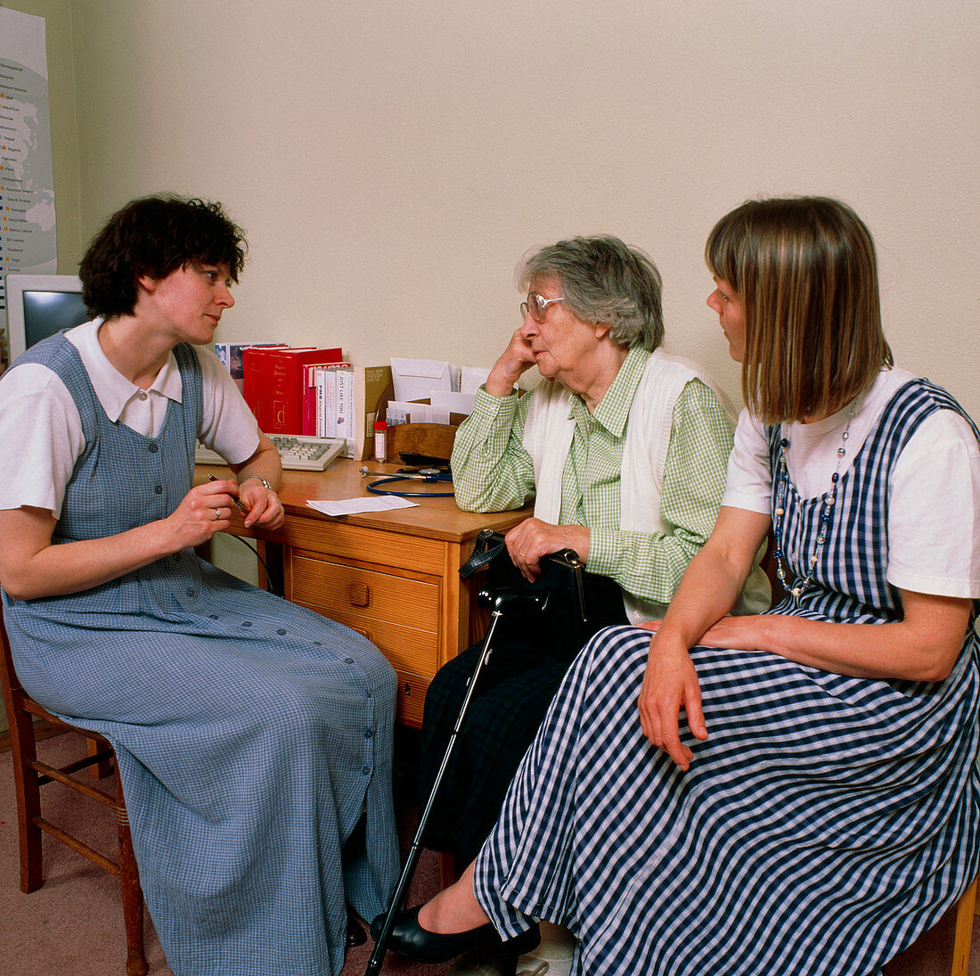 Elderly woman in consultation with doctor