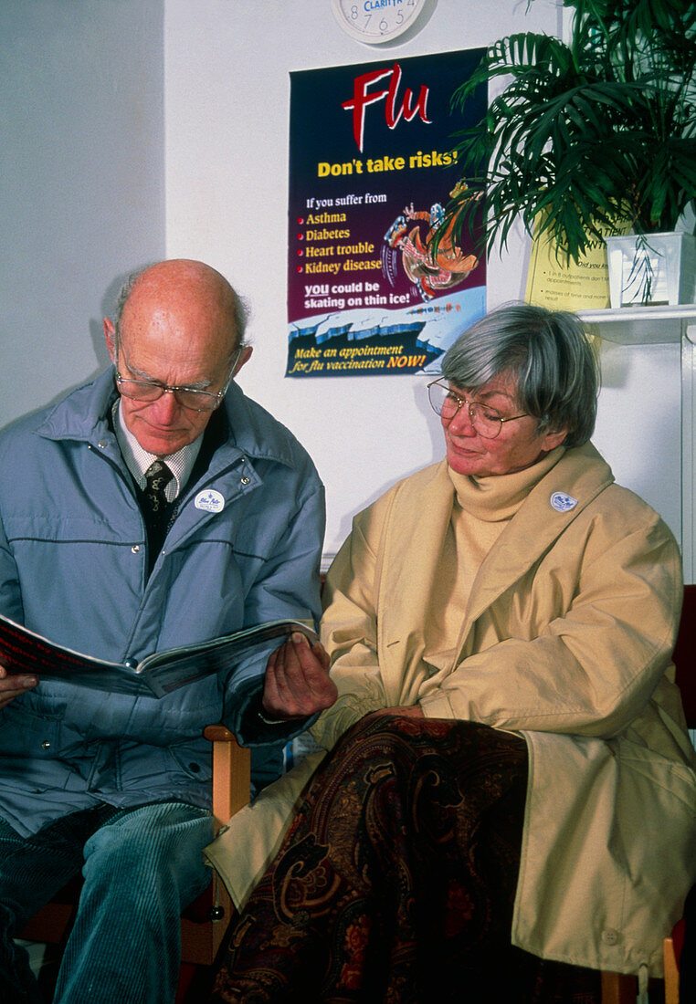 Elderly couple in doctor's waiting room