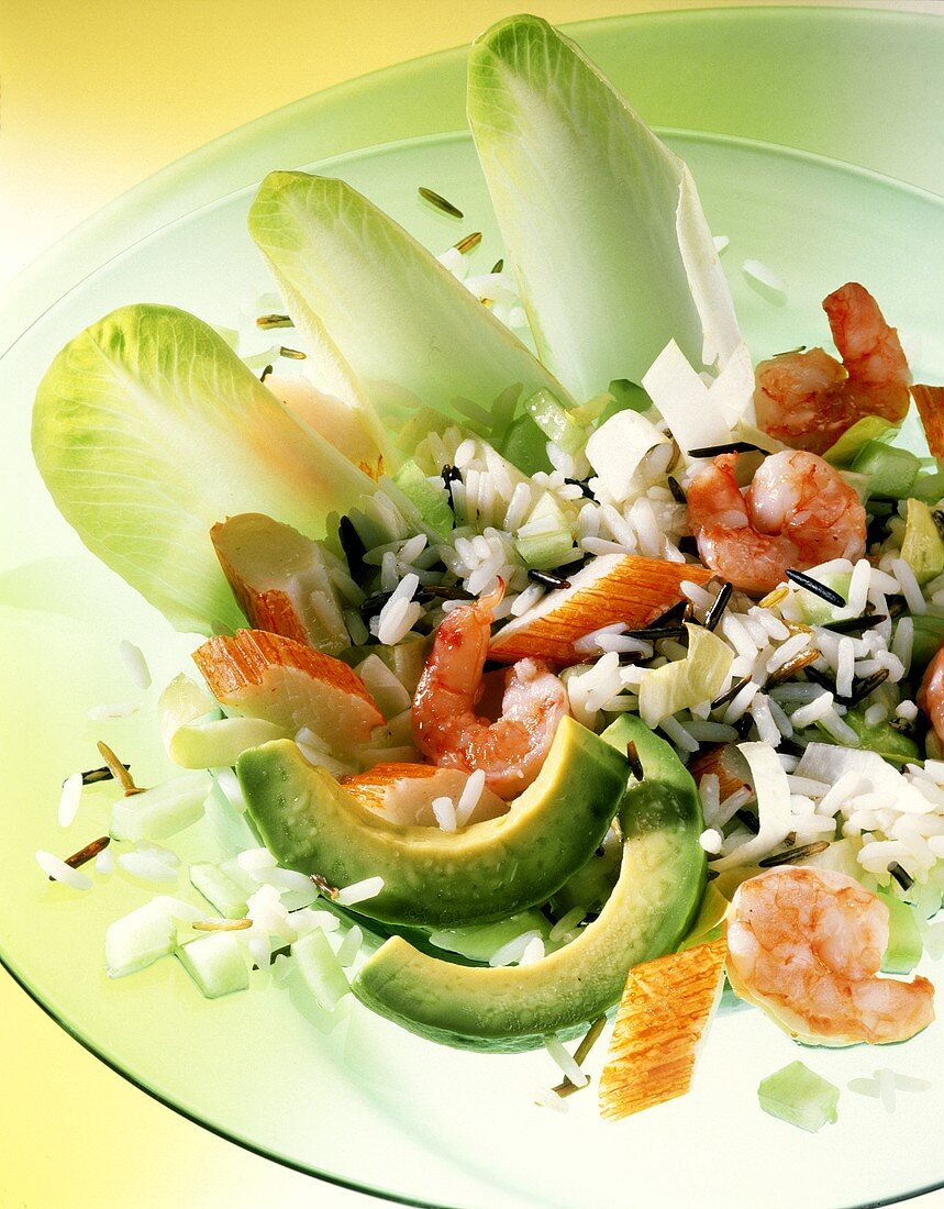 Mixed rice salad with avocados, shrimps and crabmeat