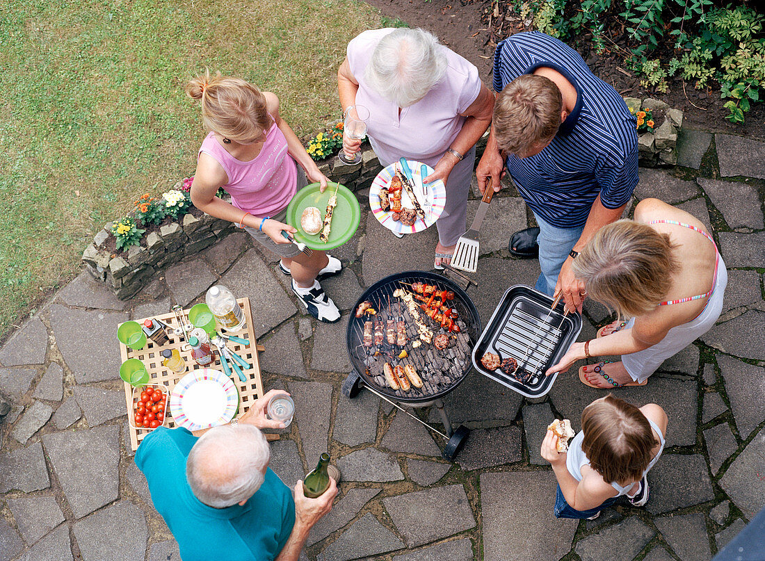 Family around a barbecue