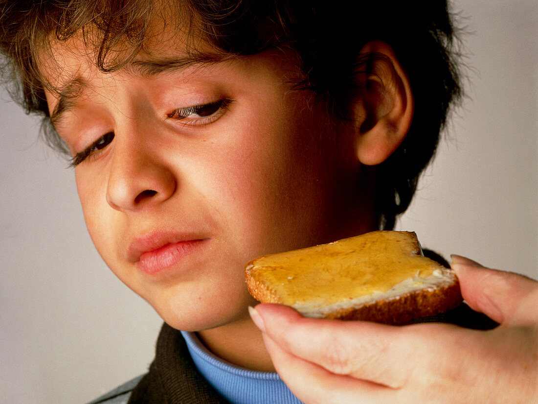 Boy refusing to eat food