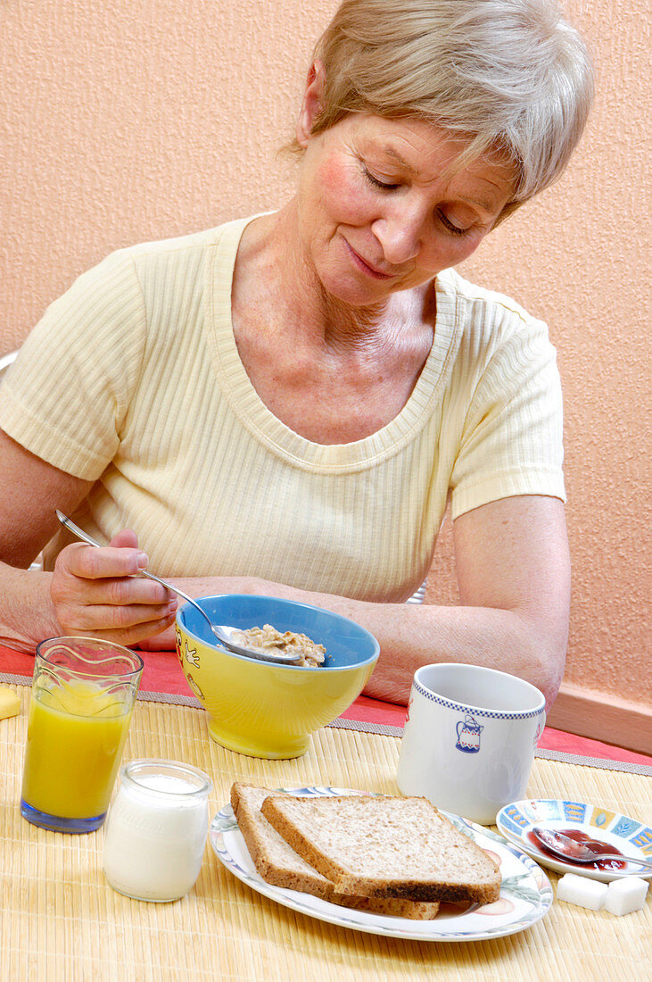 Woman eating a healthy breakfast