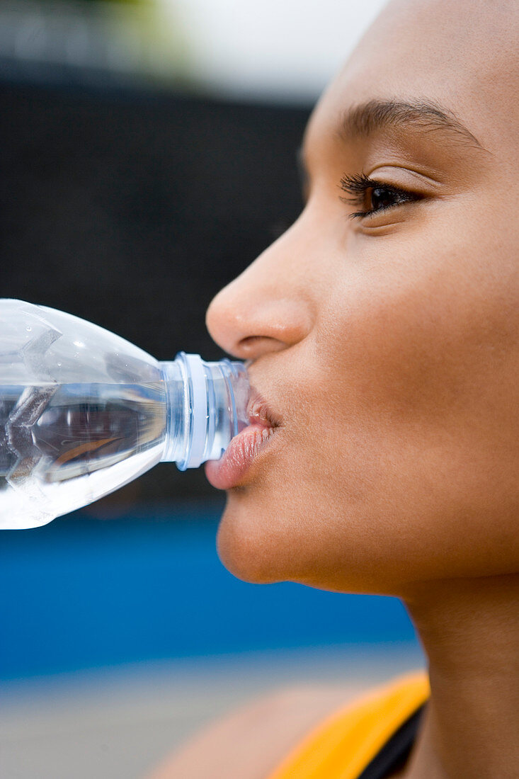 Athlete drinking water