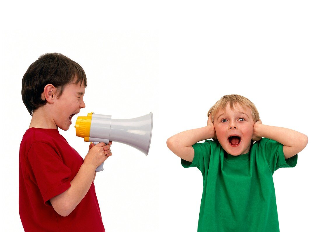 Boy shouting into a megaphone