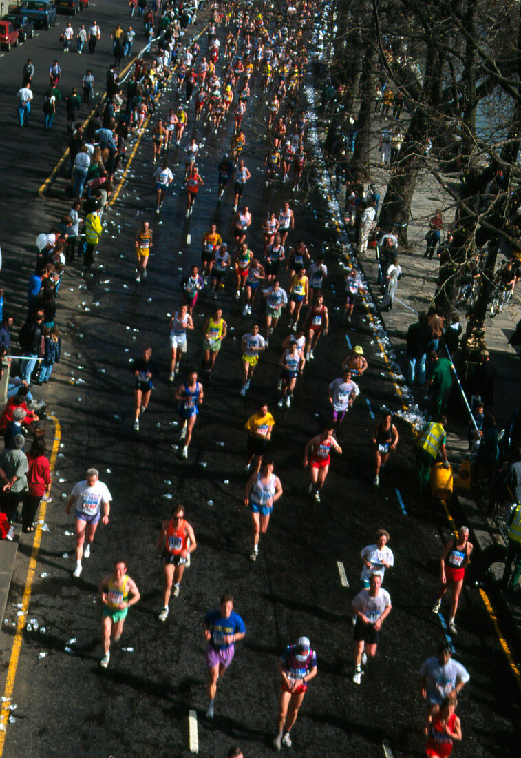 Crowd of runners on a street during a marathon