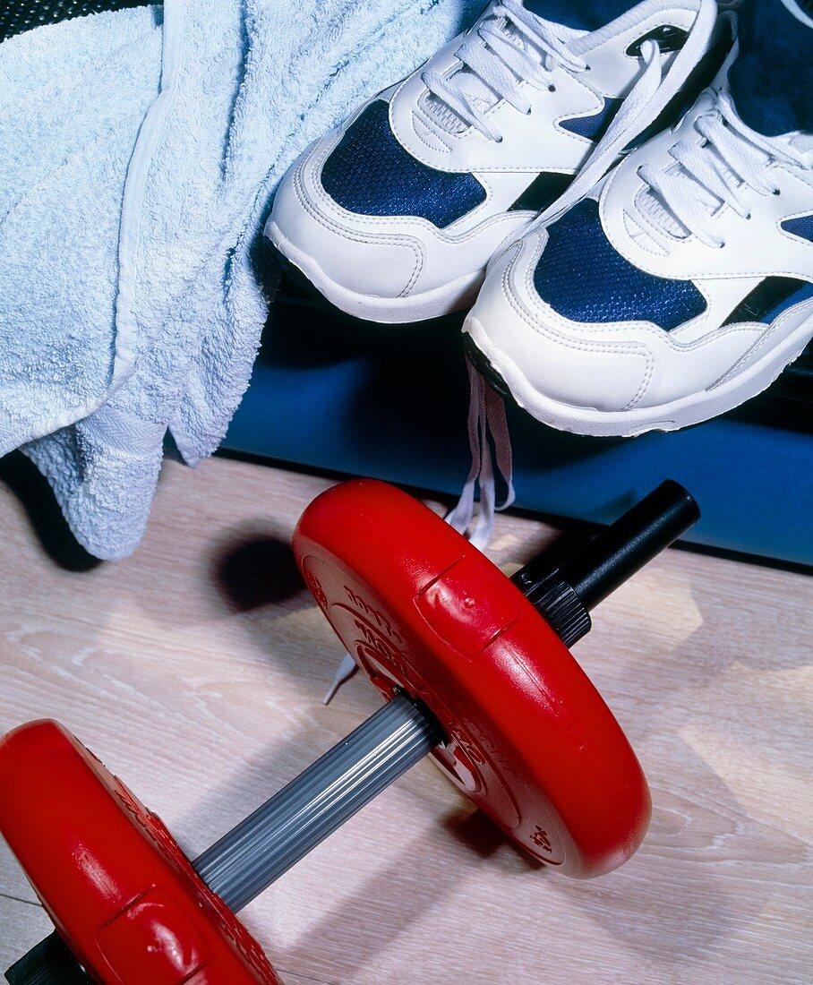 Sport equipment: training shoes and dumbell