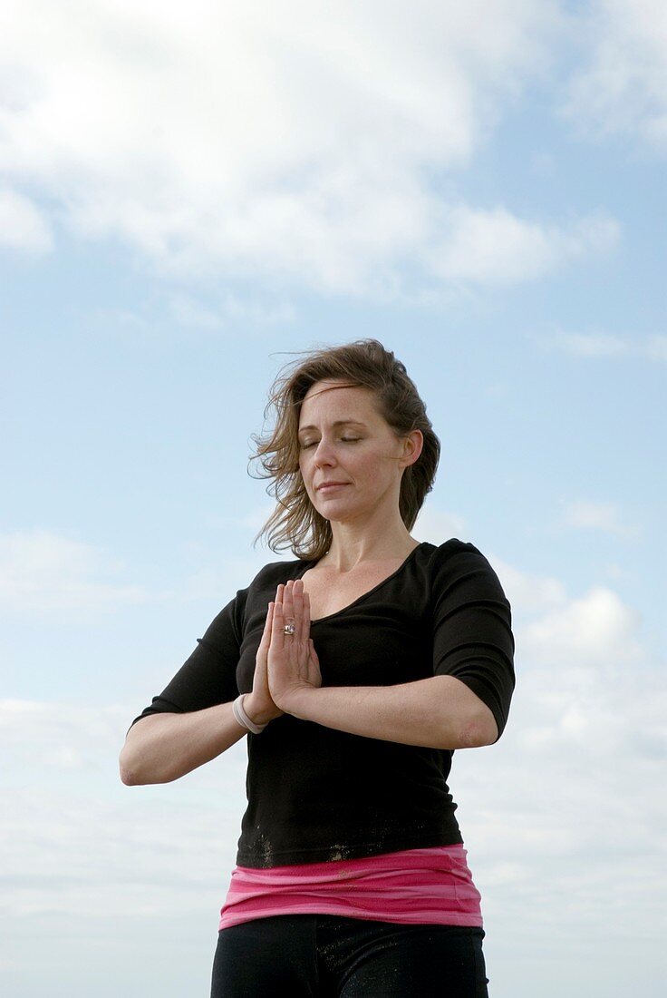 Woman performing yoga exercise