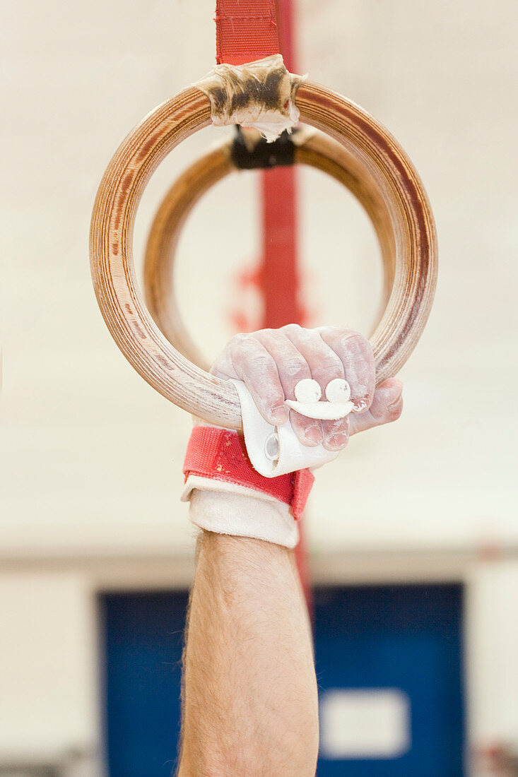 Gymnast gripping rings