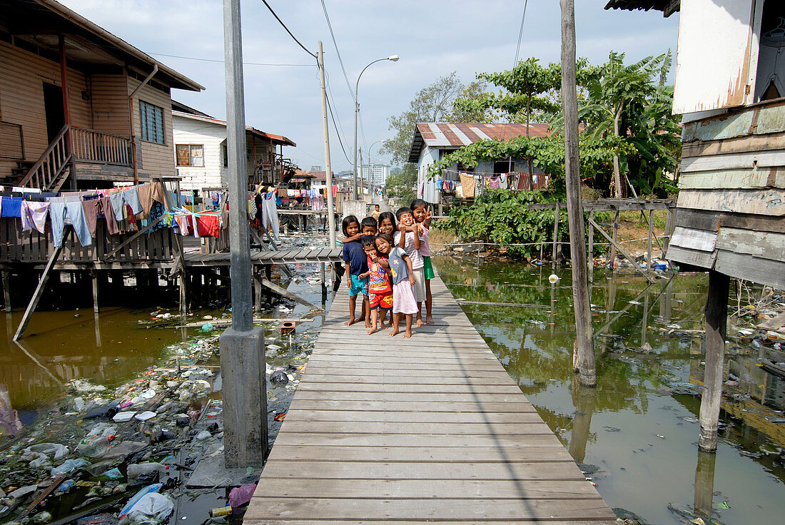 Children on a boardwalk,Malaysia