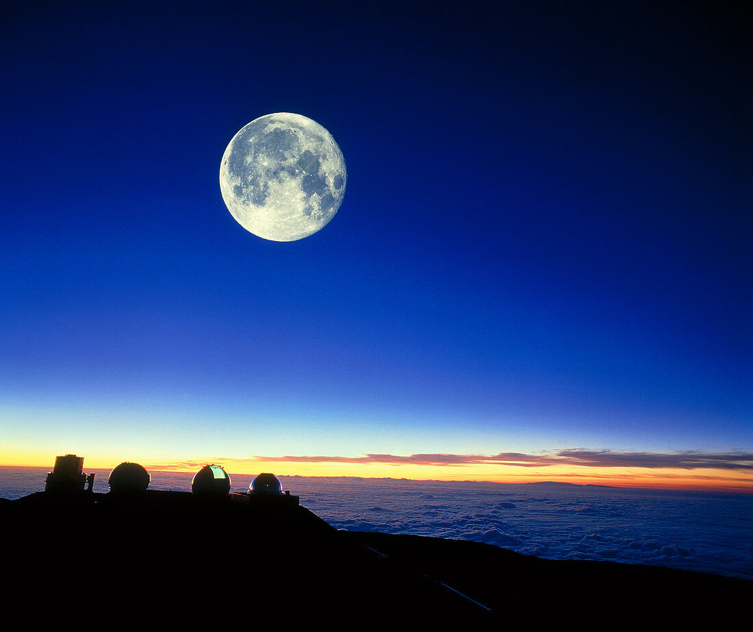 Observatories at Mauna Kea,Hawaii,with full moon