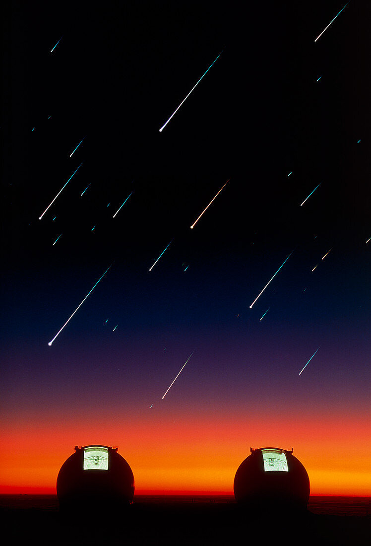 Telescope domes on Mauna Kea with meteors