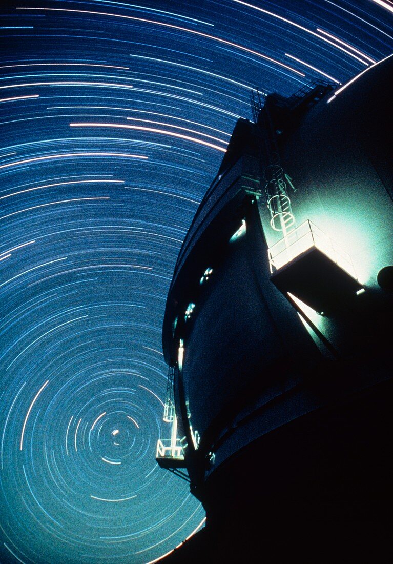 The dome of the Keck Telescope and star trails