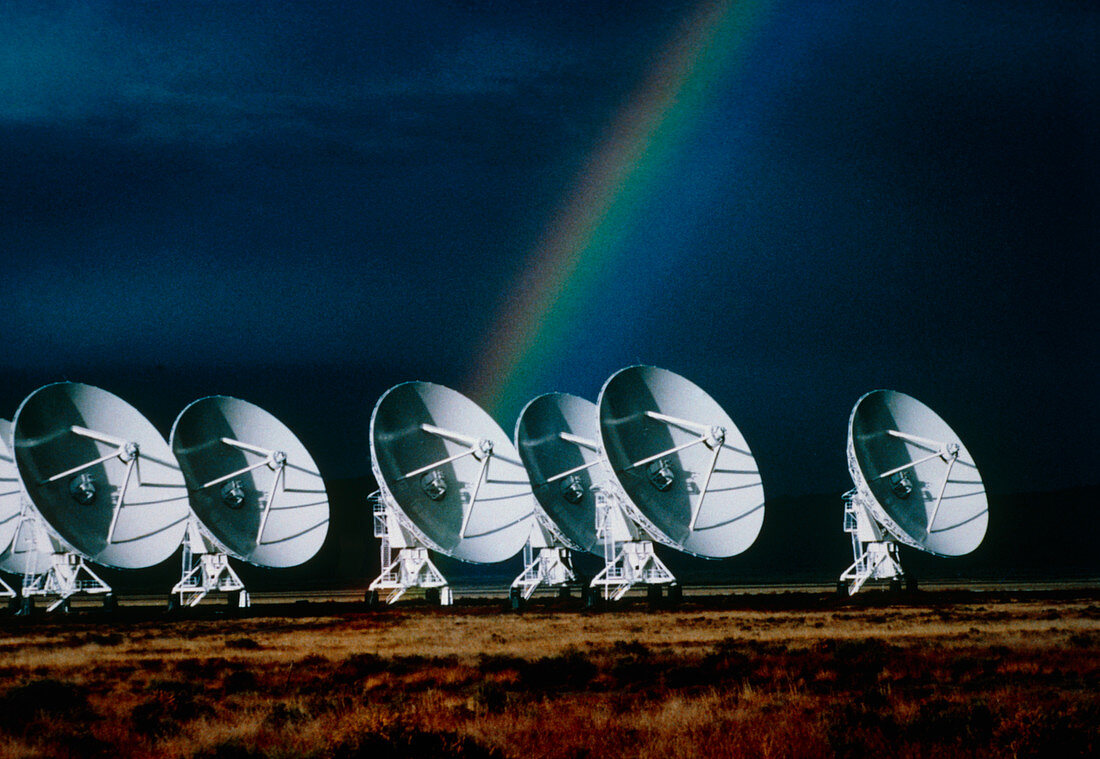 Rainbow over the dishes of the VLA radio telescope