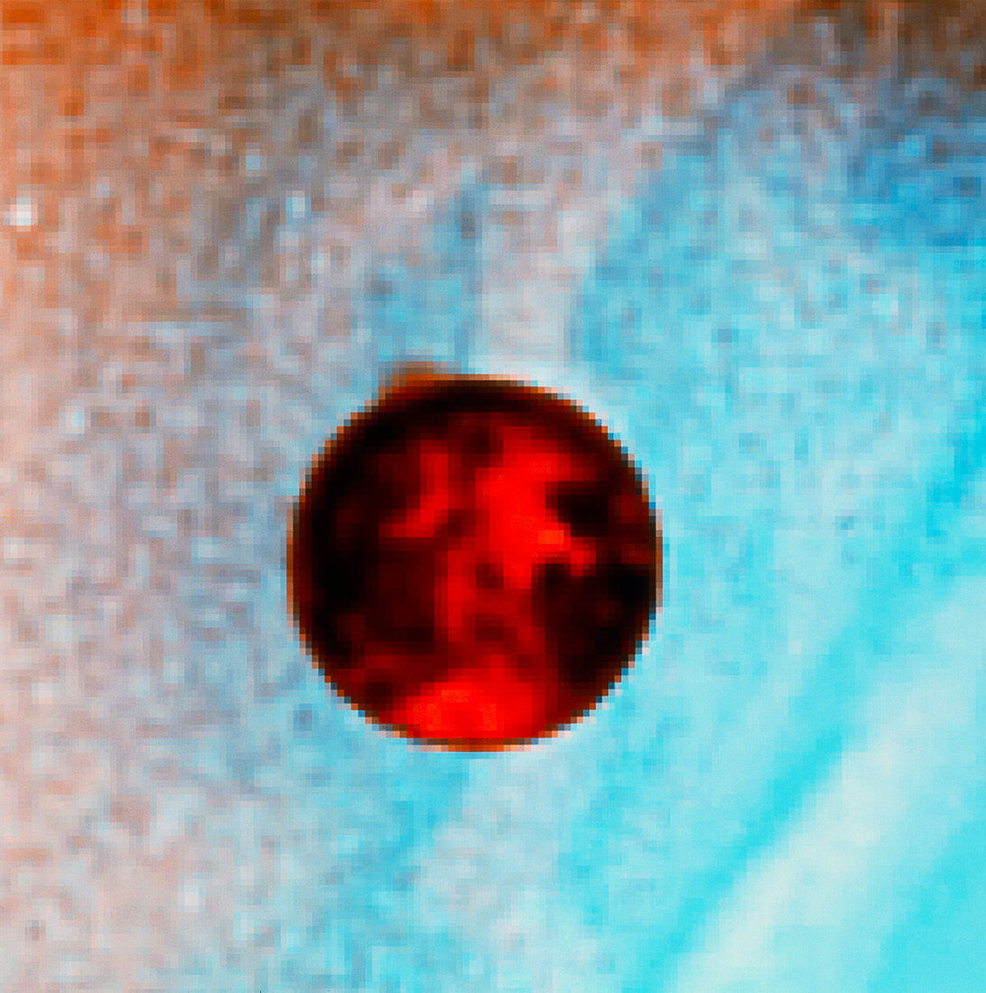 Coloured Hubble image of a volcanic plume on Io