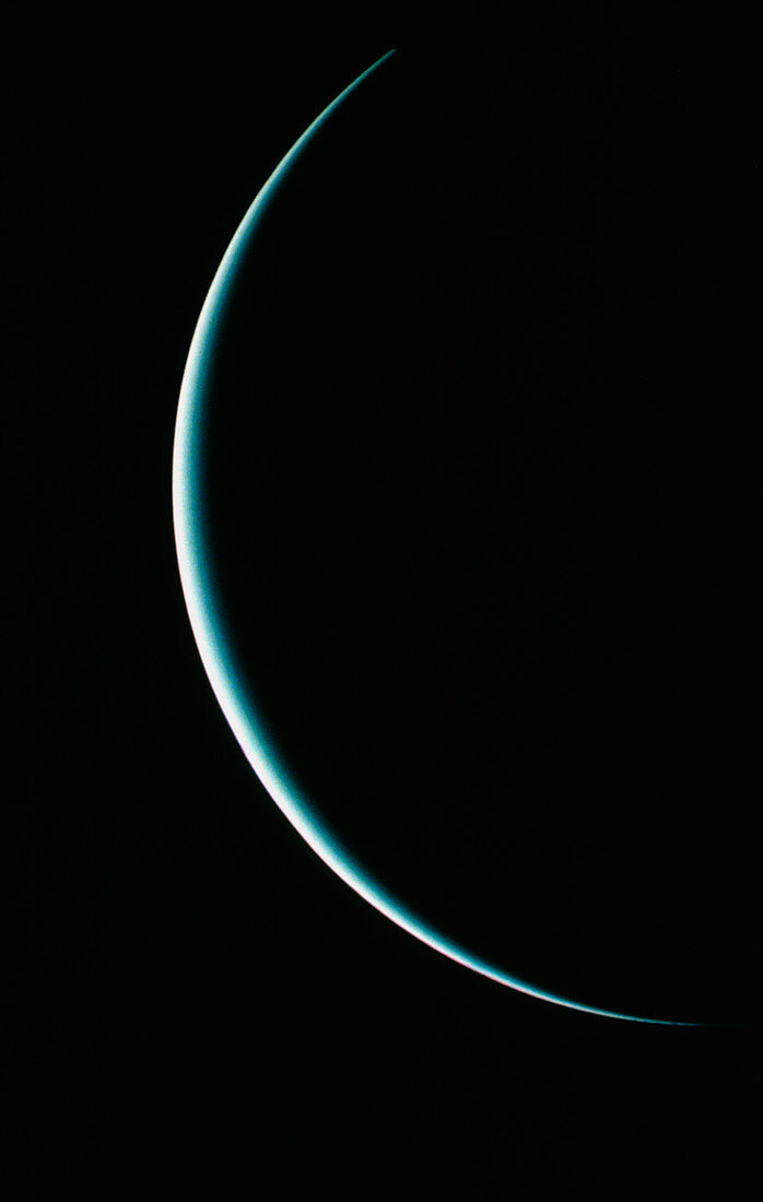 Voyager 2 image of a crescent Uranus