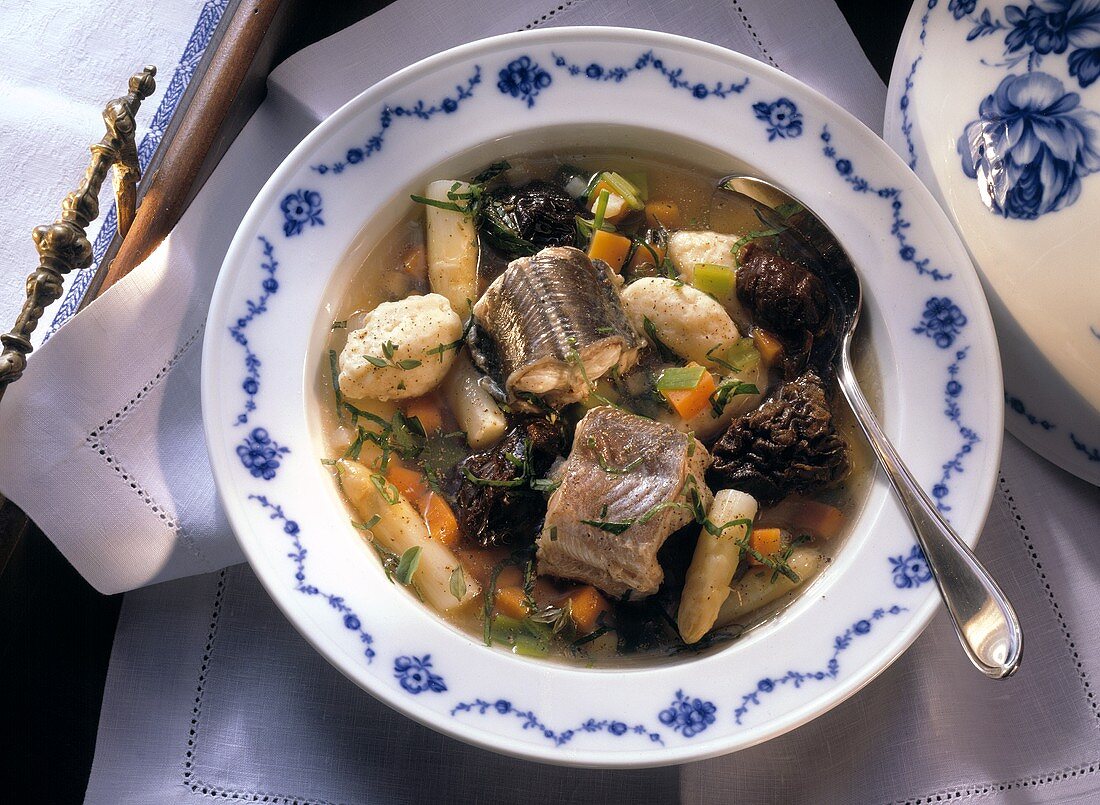 Hamburg eel soup; meat broth with eel, dried fruit & dumplings