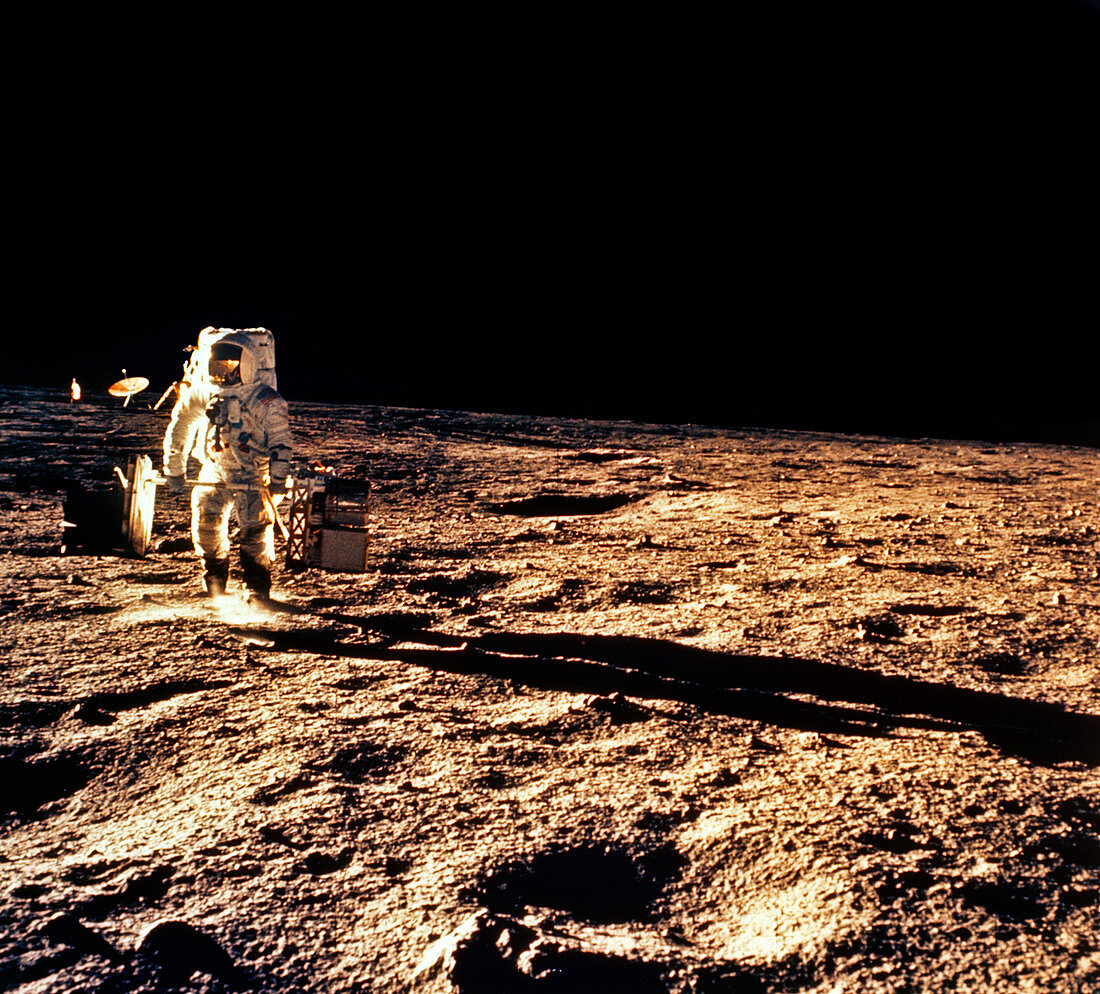 Apollo 12 astronaut walking on the Moon