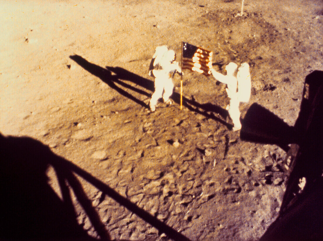 Apollo 11 photo showing placing of US flag on moon
