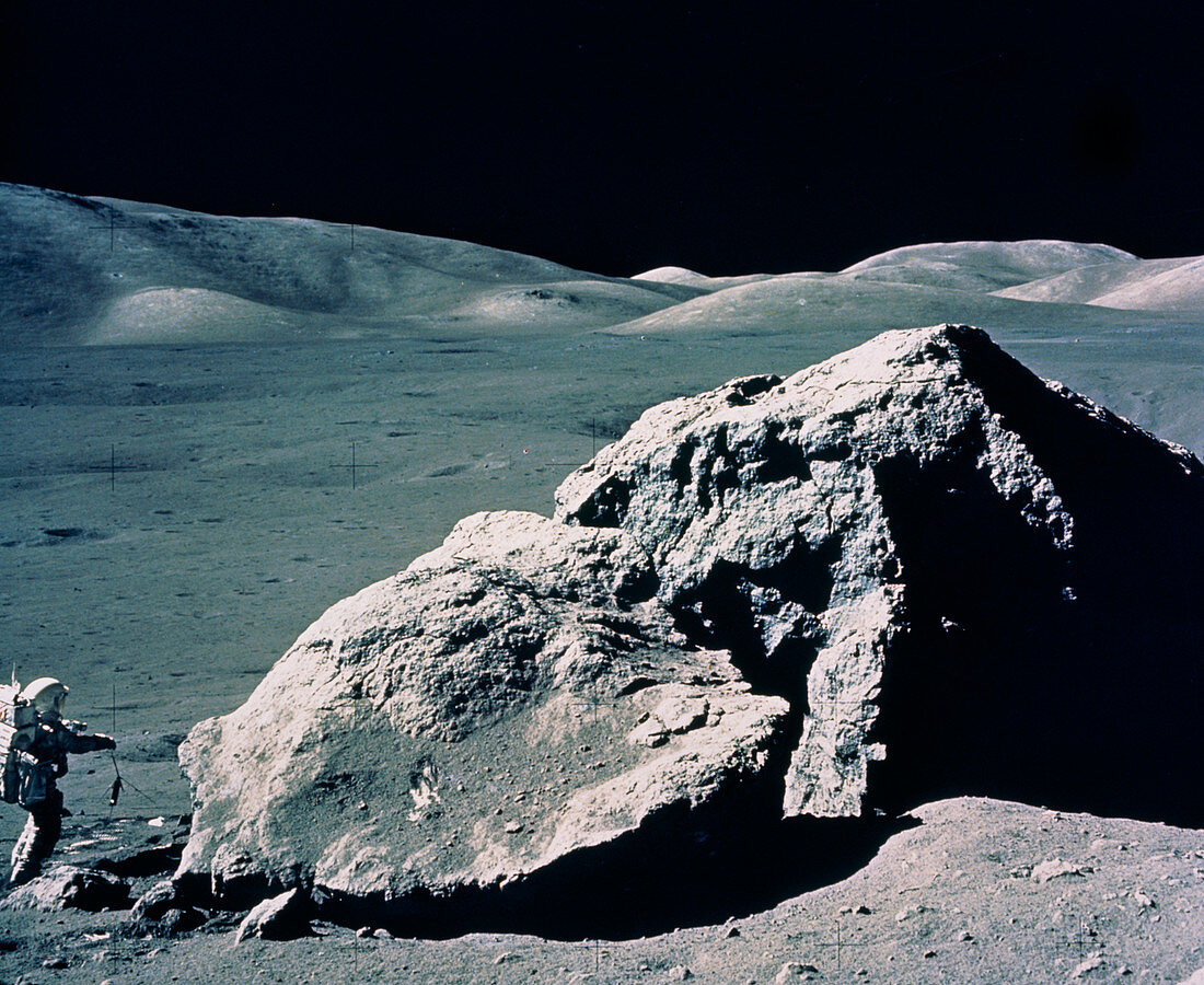 Astronaut Schmitt and huge boulder