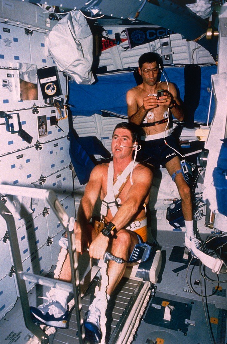 Astronauts Henricks & Runco working out,STS-44
