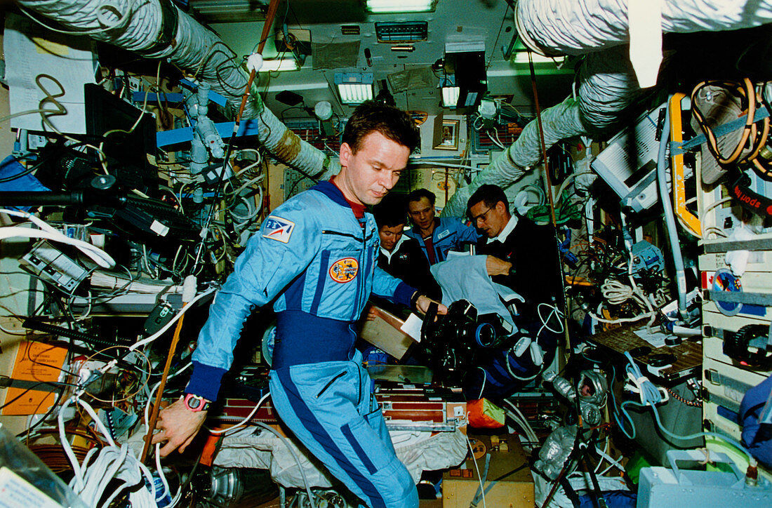 Astronauts inside the core module of Mir