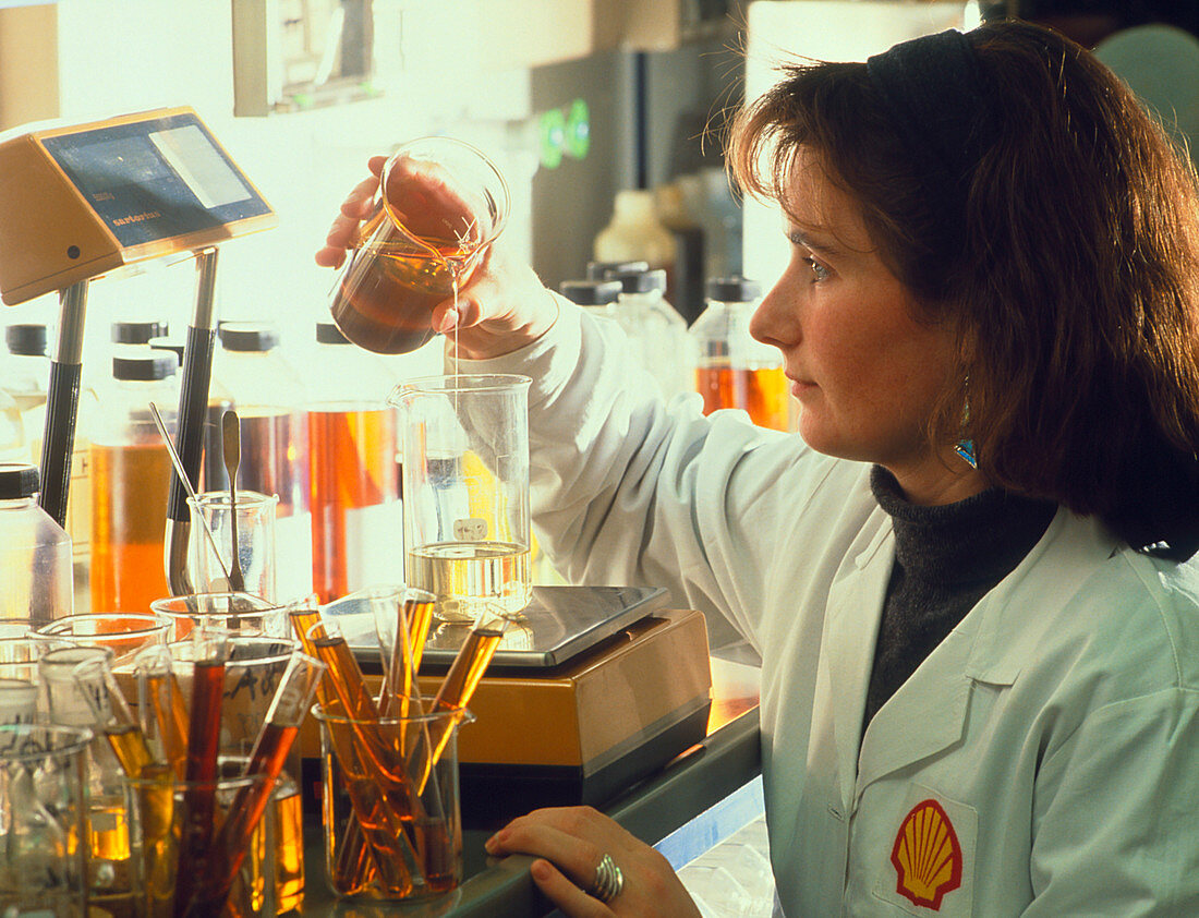 Female technician preparing oil samples