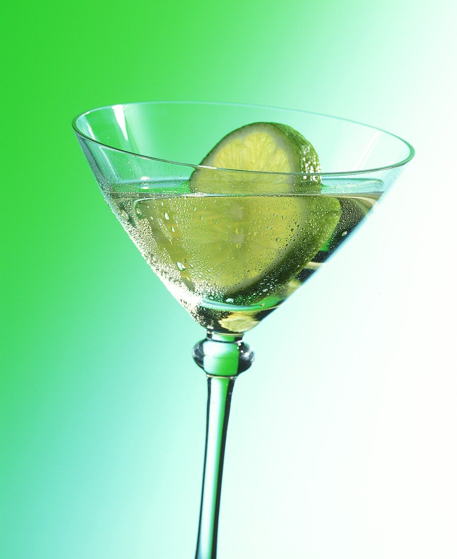 Gimlet with slice of lime