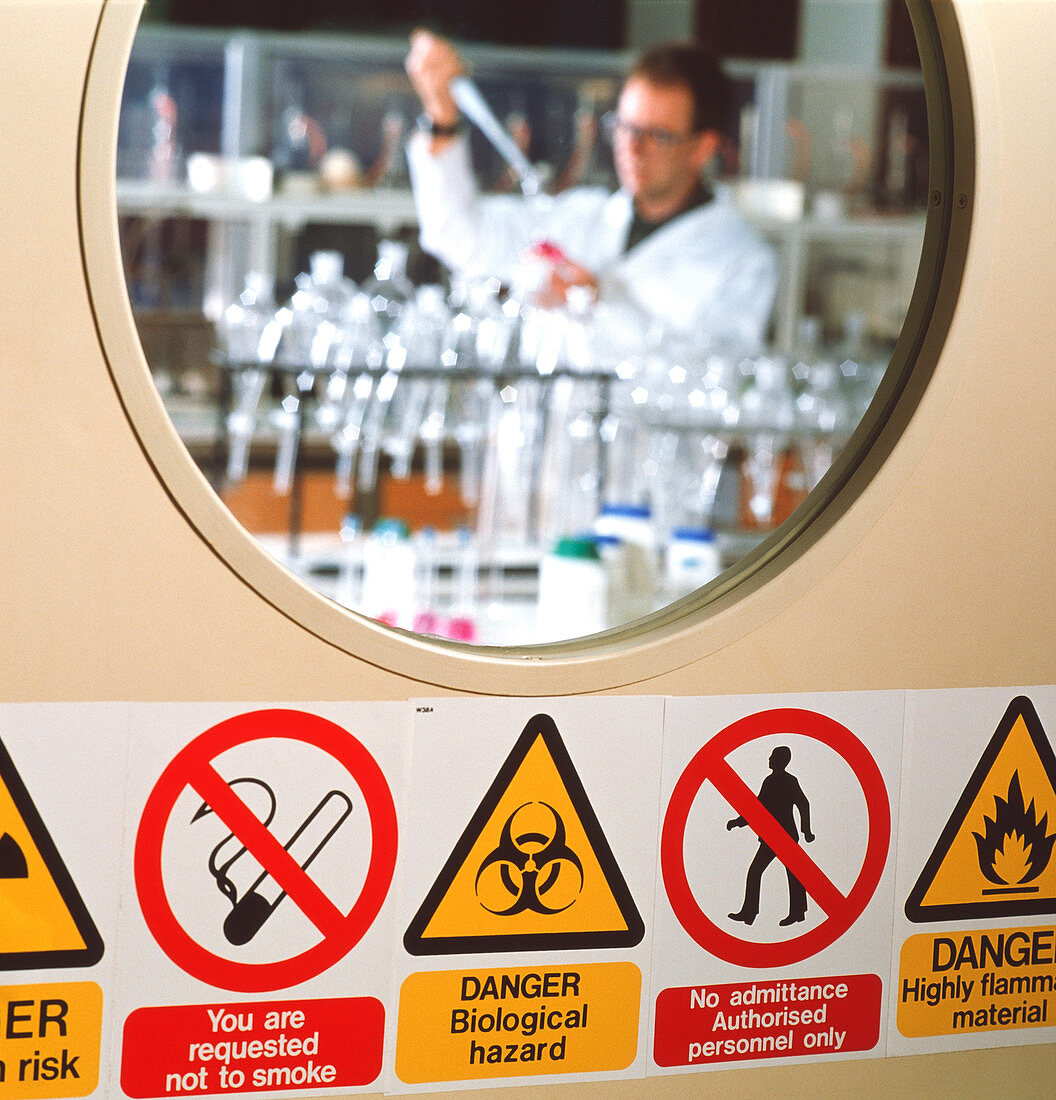 Safety signs seen on a laboratory door