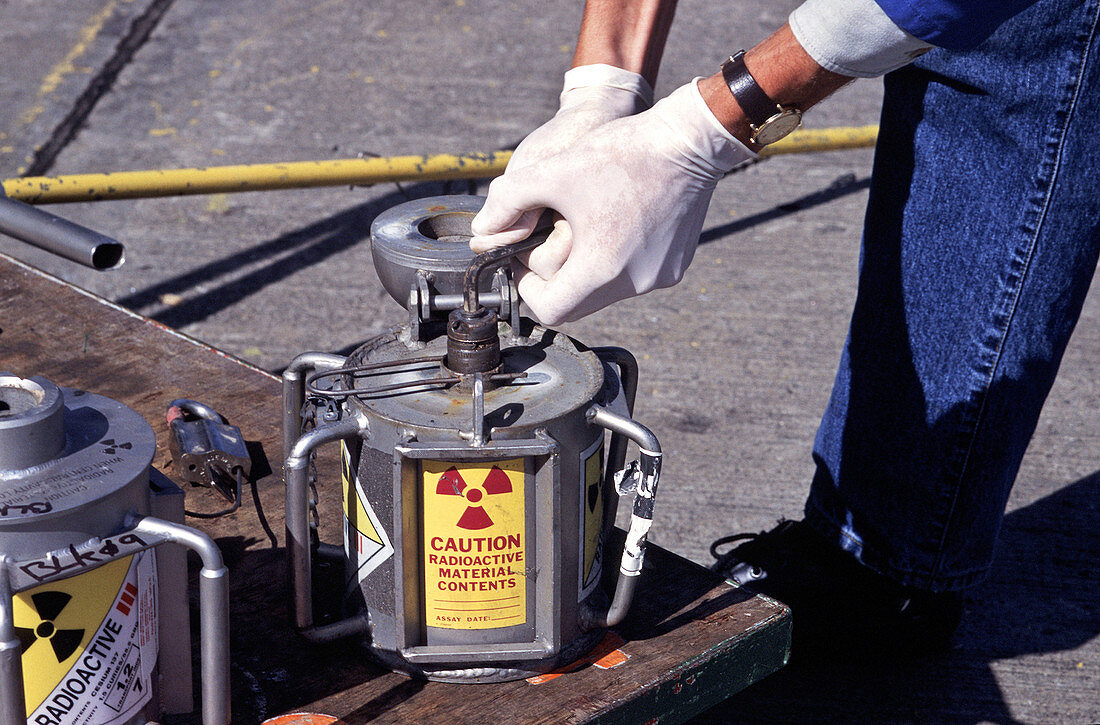 Opening a radioactive container