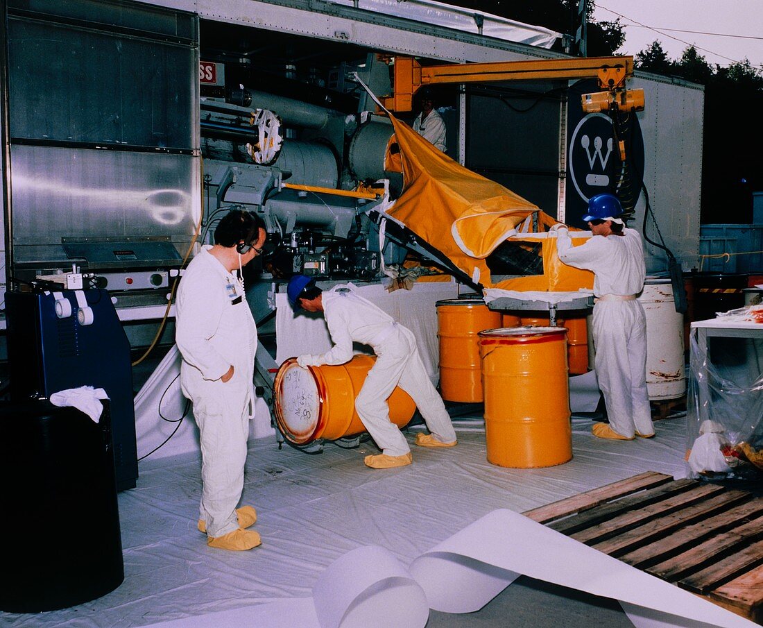 Radioactive waste being compressed for storage