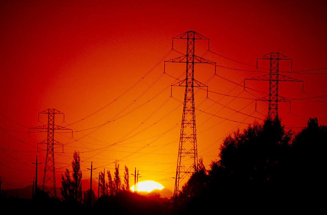 Electricity transmission lines at sunset