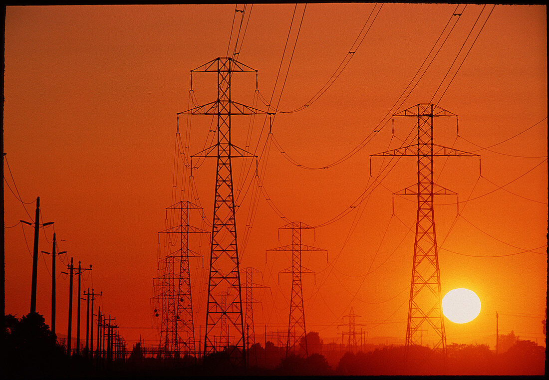 Electricity transmission lines at sunset