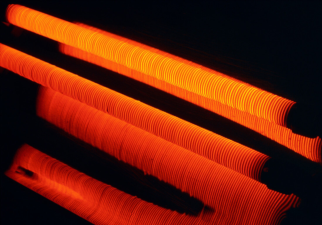 Glowing filaments of the bars of an electric fire
