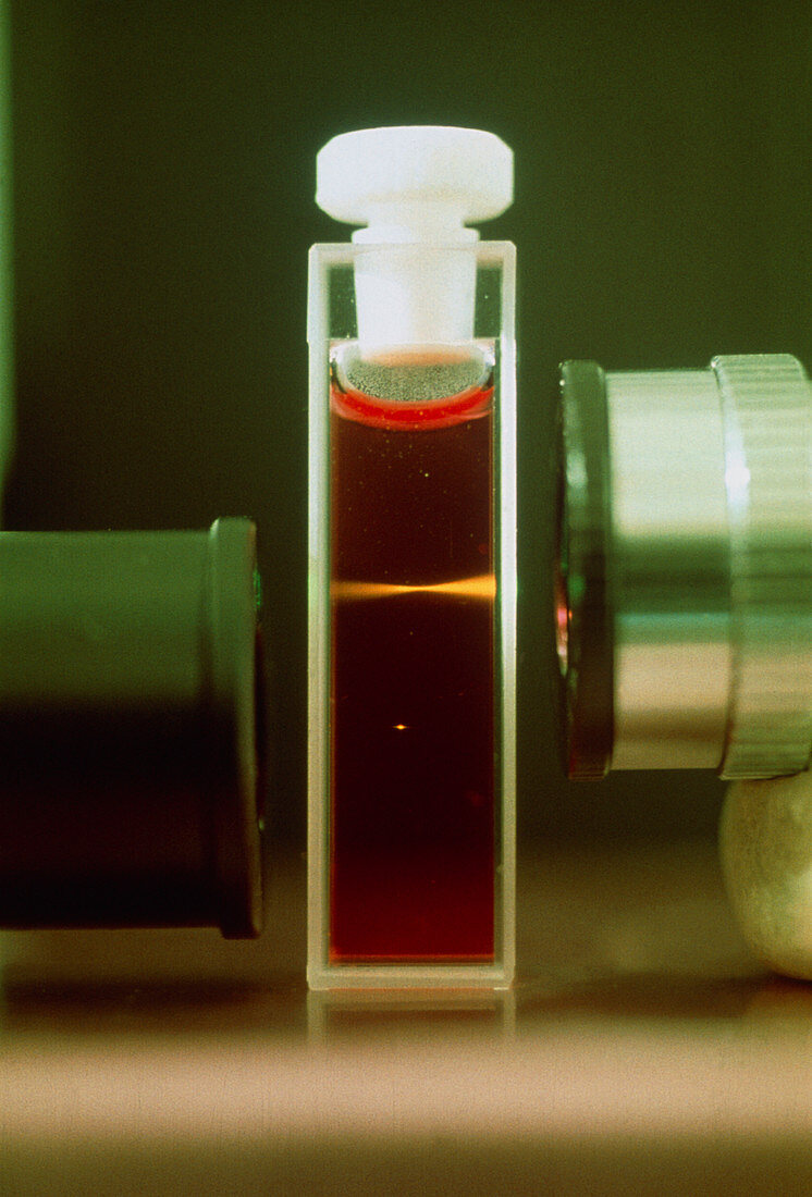 Fluorescent dye showing a pinpoint of laser light