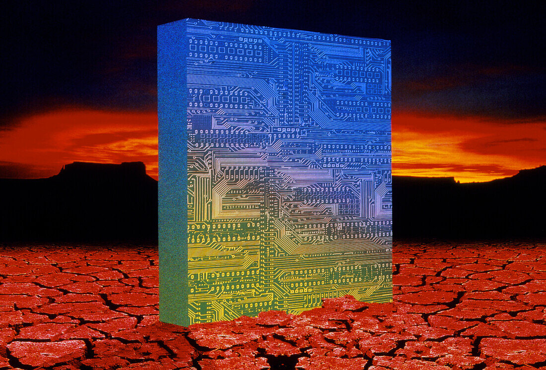 Circuit board rising from desert landscape
