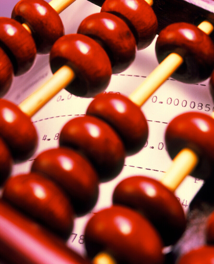 View of an abacus on a computer printout