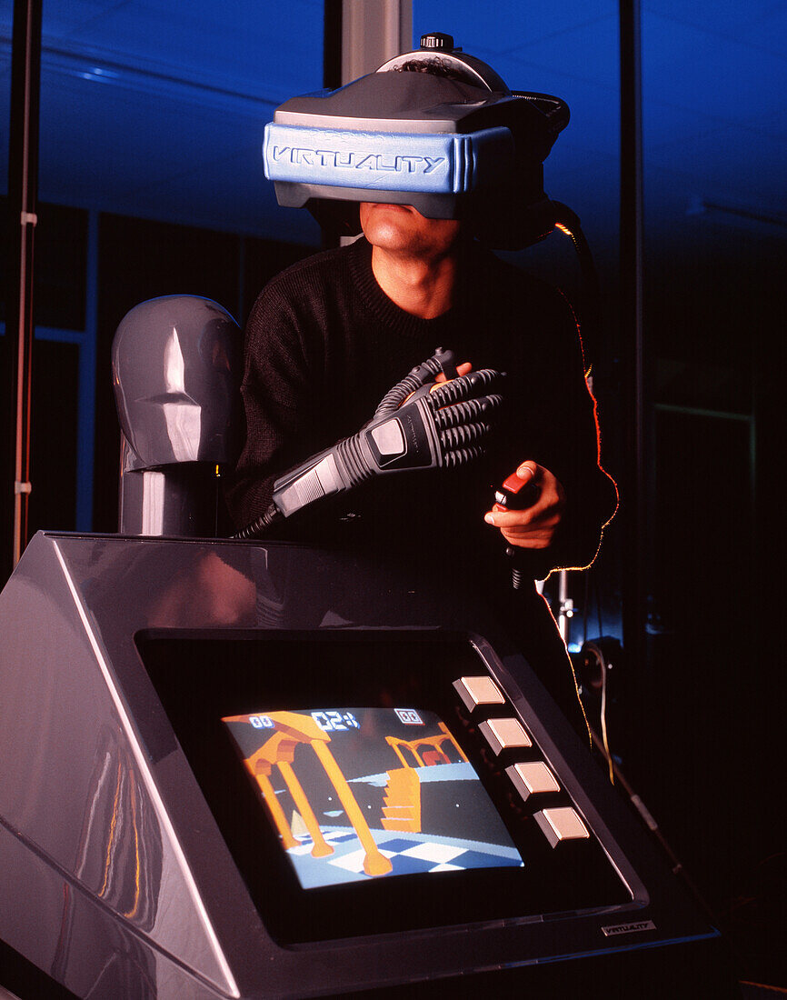 Researcher wearing virtual reality helmet & glove