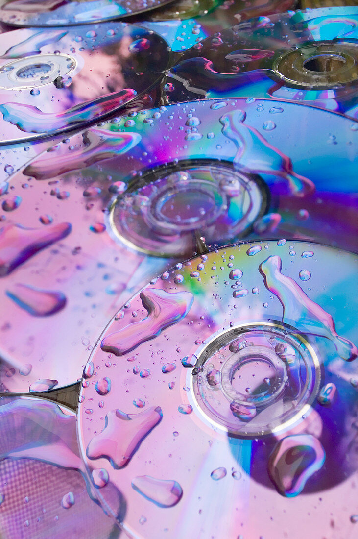 DVD discs covered in droplets of water