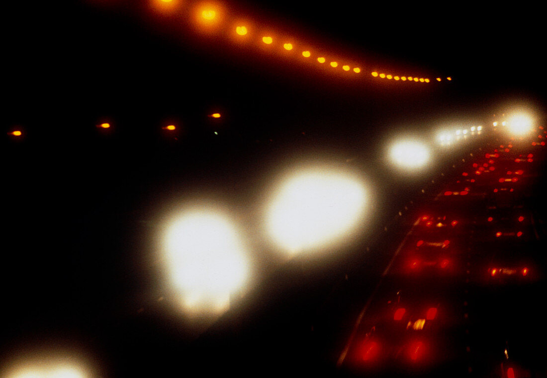 View of vehicles on a motorway at night