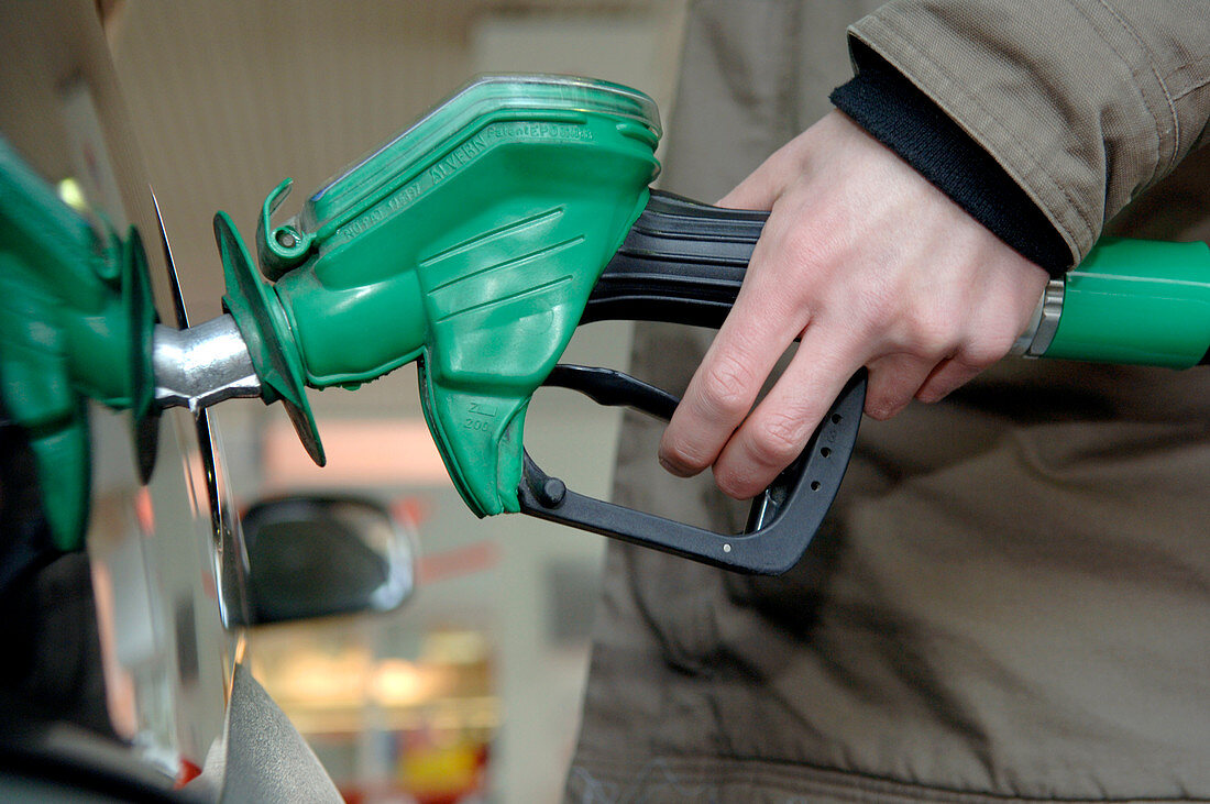 Motorist filling his petrol tank