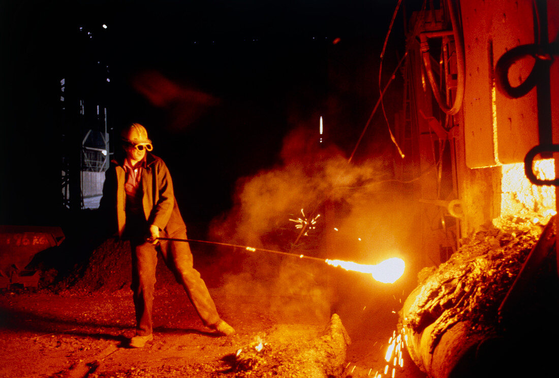 Steel worker with open-hearth furnace