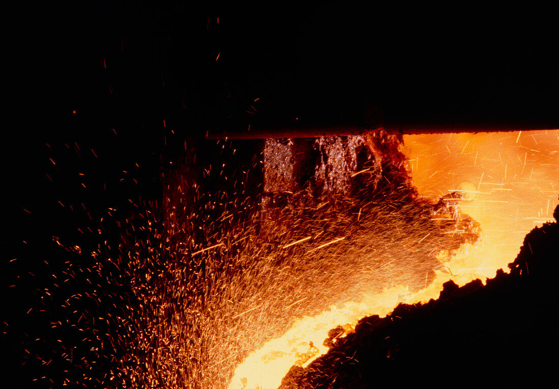 Molten iron being tapped from blast furnace