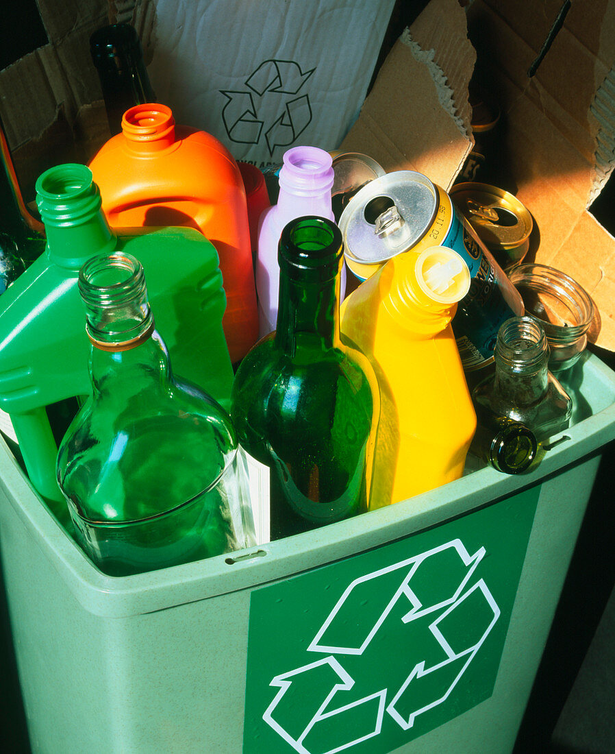 Glass,plastic and carboard in a recycling bin