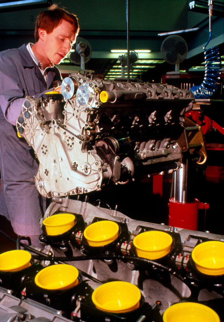 Technician with Renault Formula One engine