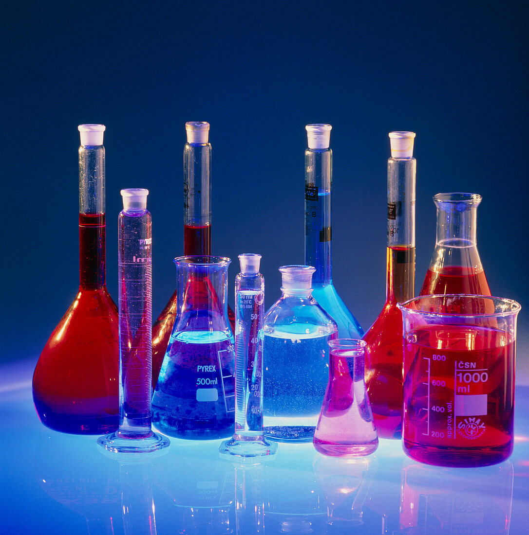 Laboratory flasks containing chemical solutions