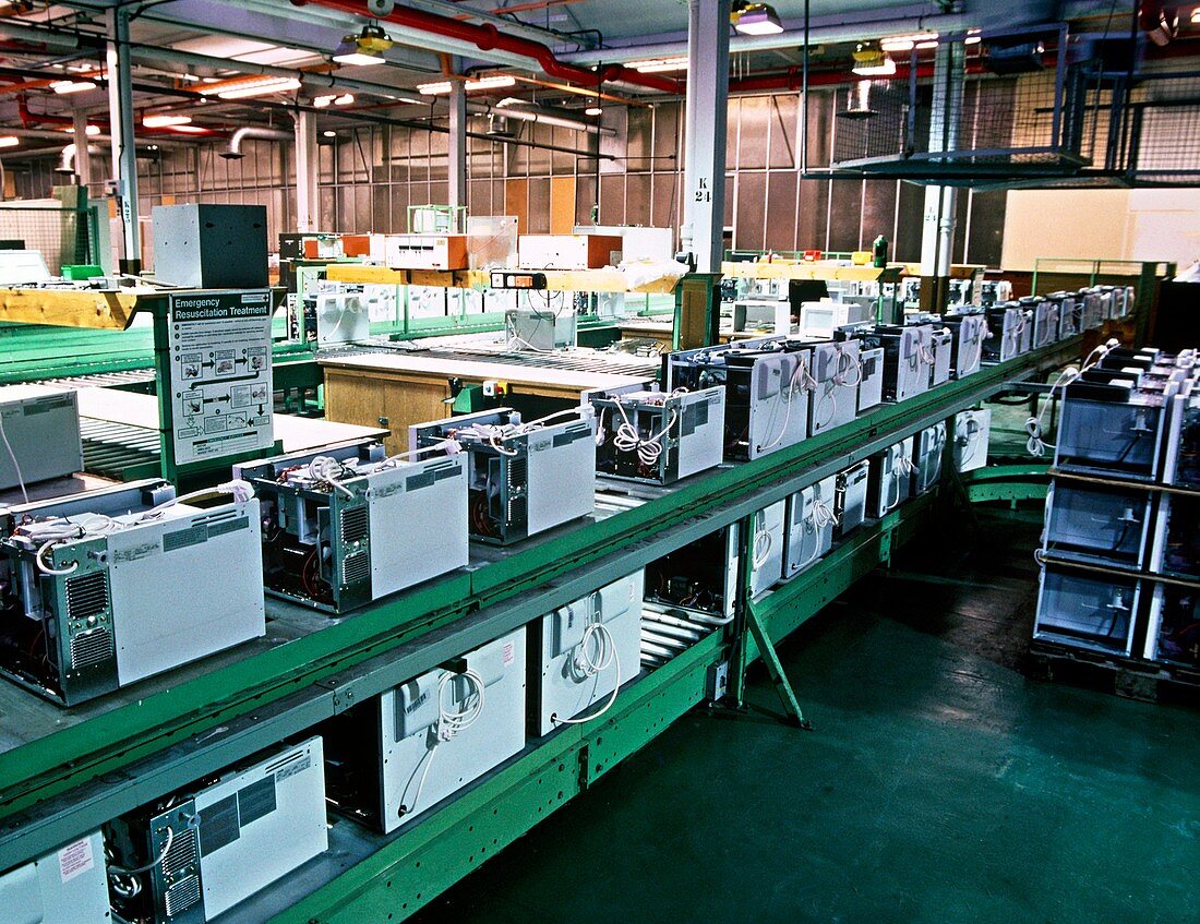Assembly line for microwave ovens